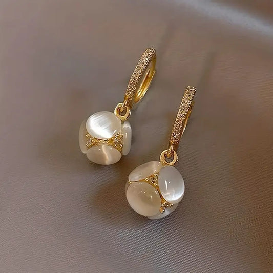 Lunar Grace – Moonstone Dangle Earrings in Golden Setting
